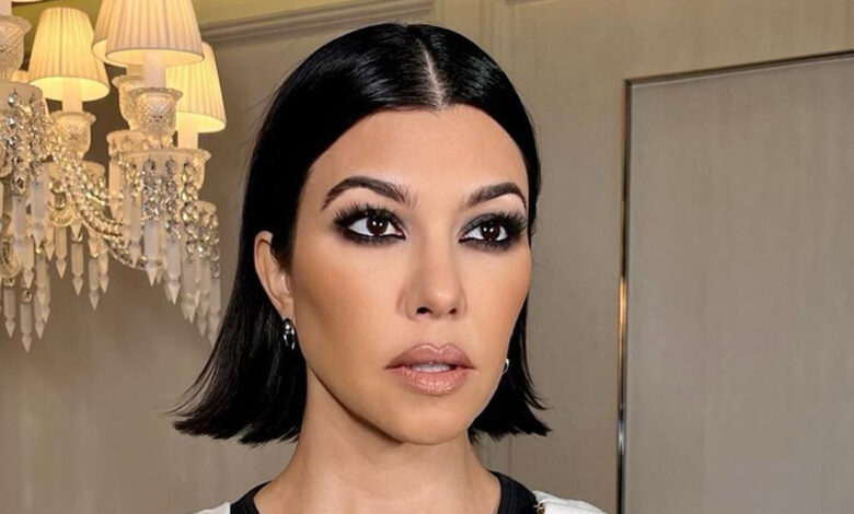 Kourtney Kardashian flaunts her baby bump as she goes pantless in never-before-seen pic & begs fans for pregnancy tips