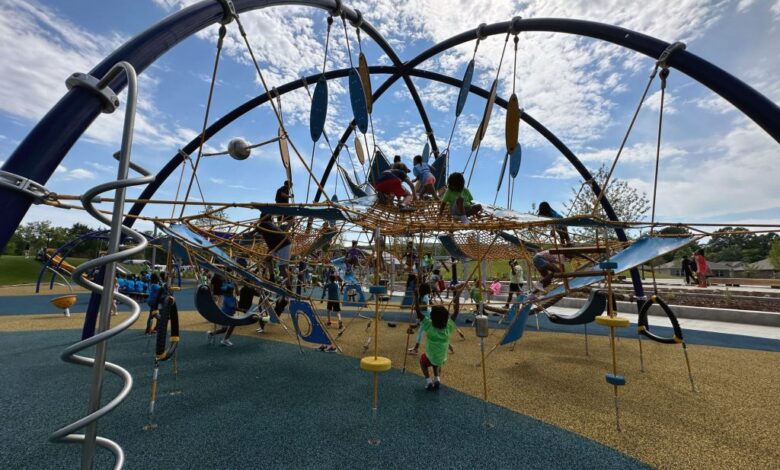 children playing outdoors on a jungle gym