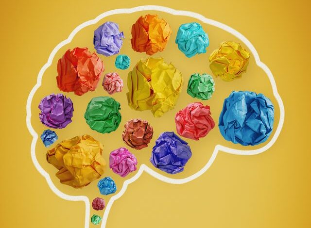 creative mind colorful crumpled paper balls in brain shape