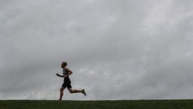 A runner pushes along the final stretch of the course during the 2019 Memphis in May triathlon at Edmund Orgill Park in Millington on Sunday, May 19, 2019. Jordan Green and Kirsten Sass were the winners of the annual triathlon.
