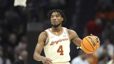 Texas guard Tyrese Hunter brings the ball down court against Colorado State during the second half of a first-round college basketball game in the NCAA Tournament, Thursday, March 21, 2024, in Charlotte, N.C. (AP Photo/Chris Carlson)