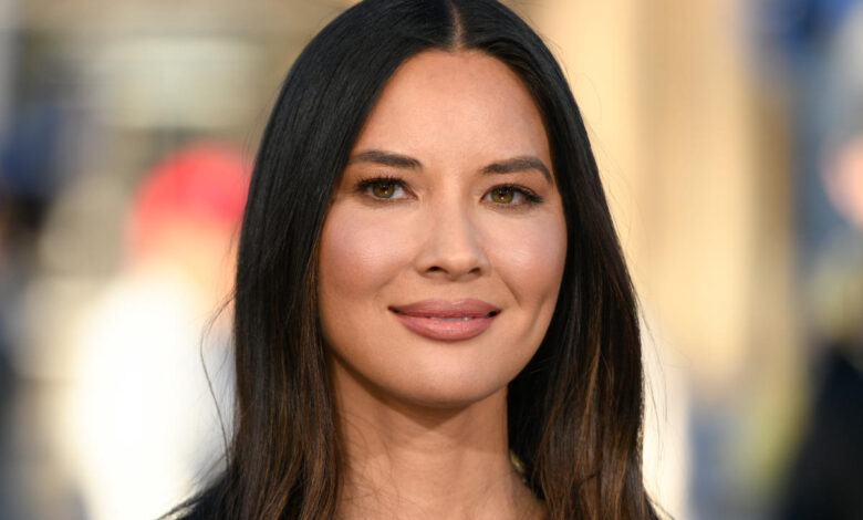 Olivia Munn is going through medically induced menopause after breast cancer treatment. Here's what that means.