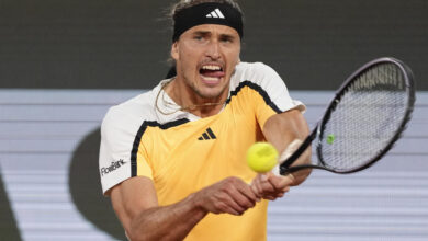 Germany's Alexander Zverev plays a shot against Denmark's Holger Rune during their fourth round match of the French Open tennis tournament at the Roland Garros stadium in Paris, Monday, June 3, 2024. (AP Photo/Thibault Camus)