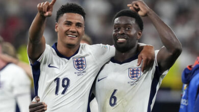 England's Ollie Watkins, left, celebrates with England's Marc Guehi after winning a semifinal match between the Netherlands and England at the Euro 2024 soccer tournament in Dortmund, Germany, Wednesday, July 10, 2024. (AP Photo/Frank Augstein)