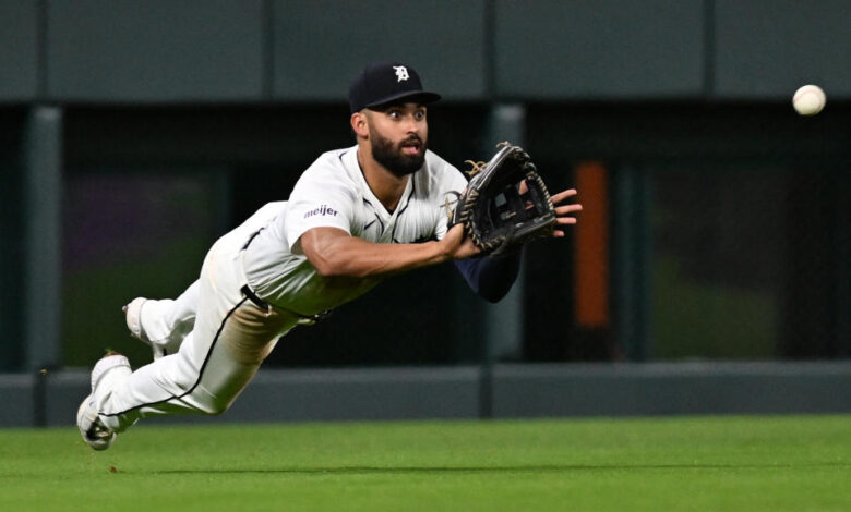 Sep 25, 2024; Detroit Tigers left fielder Riley Greene (31) makes a diving catch against the Tampa Bay Rays for the last out of the eighth inning at Comerica Park. Mandatory Credit: Lon Horwedel-Imagn Images