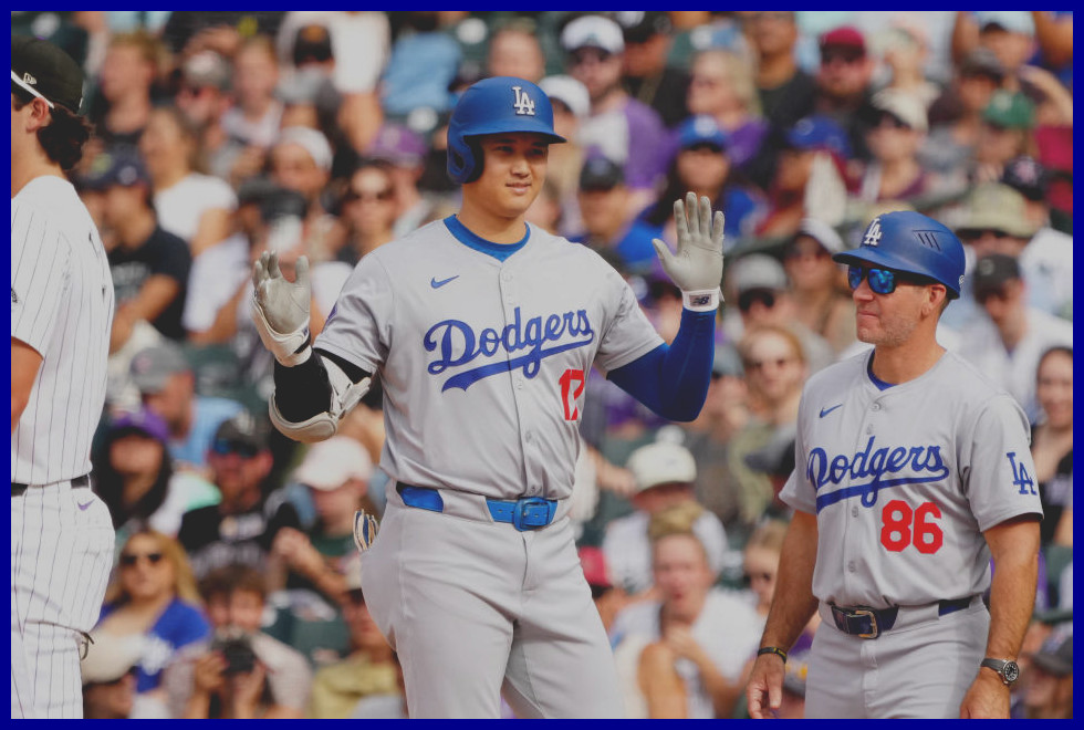 Sep 29, 2024; Denver, Colorado, USA; Los Angeles Dodgers designated hitter Shohei Ohtani (17) celebrates his single during the eighth inning against the Colorado Rockies at Coors Field. Mandatory Credit: Ron Chenoy-Imagn Images