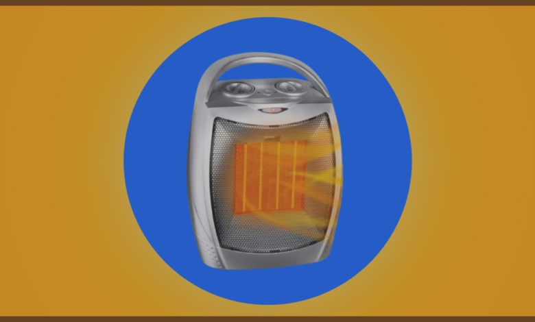 silver space heater over blue and orange background