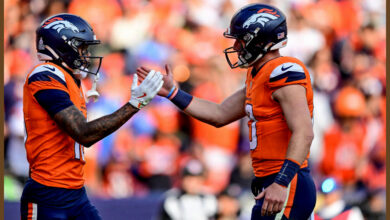 DENVER, COLORADO - OCTOBER 13:  Troy Franklin #16 and Bo Nix #10 of the Denver Broncos celebrate after a fourth quarter touchdown against the Los Angeles Chargers at Empower Field at Mile High on October 13, 2024 in Denver, Colorado. (Photo by Dustin Bradford/Getty Images)